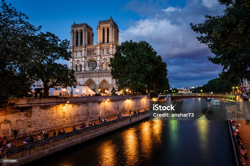 Notre Dame de Paris Cathedral and Seine River Notre Dame de Paris Cathedral and Seine River in the Evening, Paris, France Architecture Stock Photo