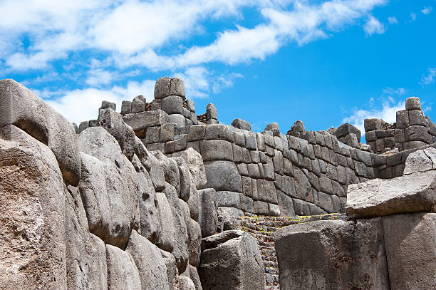 Peru, Cusco. Saksaywaman is a citadel on the northern outskirts of the city of Cusco, On the first sections of the citadel the incas built dry stone walls constructed of huge stones. The workers carefully cut the boulders to fit them together tightly without mortar. This site is at an altitude of 3,701 m.