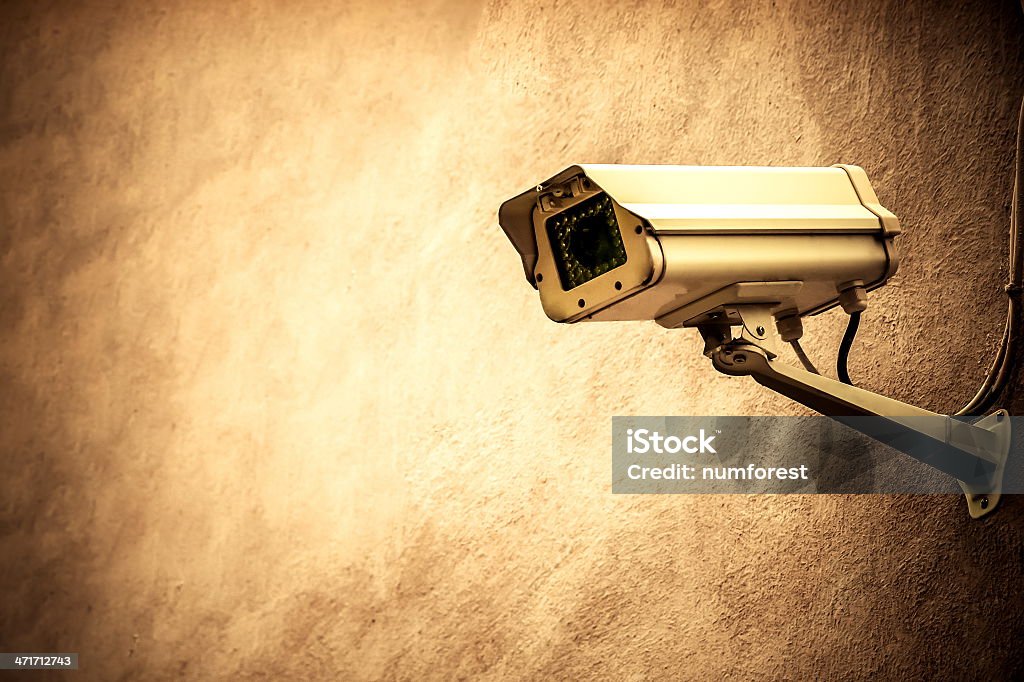 CCTV sulla parete - Foto stock royalty-free di Ambientazione esterna