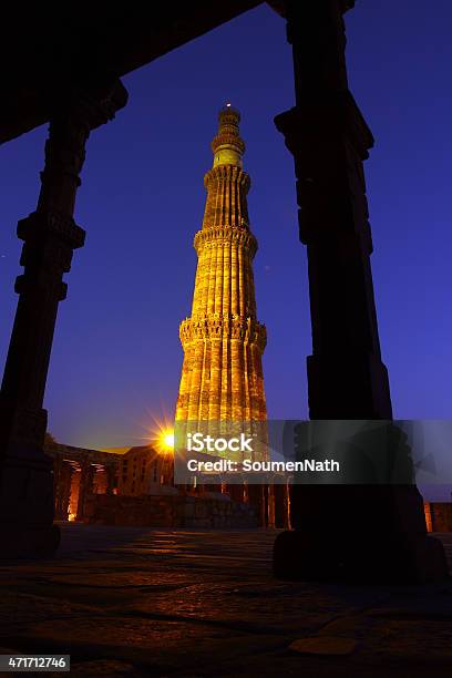 Qutab Minar An Archaeological Monument Illuminated At Night Stock Photo - Download Image Now