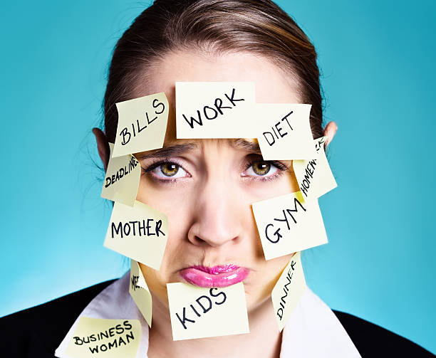 istock Overcommitted woman pouts, tired of multitasking 471713847