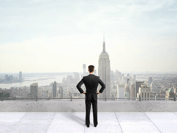 istock businessman on roof 471716703
