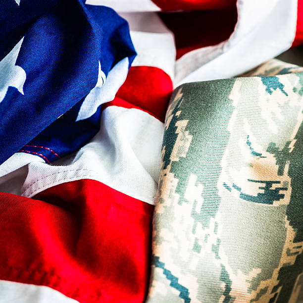 istock American Military Uniform and US Flag 471717115