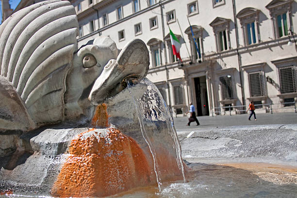 istock Fountain detail and Palazzo Montecitorio. 471717987