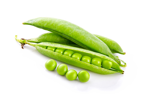 Fresh green pea pods and seeds isolated on white background