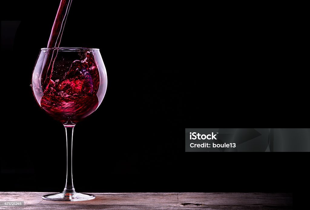 Elegant Red Wine Glass In Black Background Stock Photo - Download Image Now  - Alcohol - Drink, Black Background, Close-up - iStock