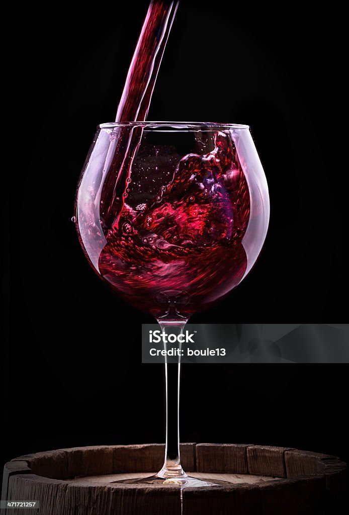 Elegant red wine glass in black background Elegant red wine glass  in black background Alcohol - Drink Stock Photo