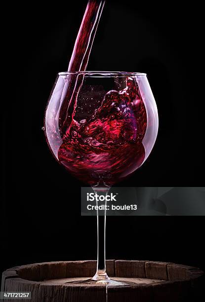 Elegant Red Wine Glass In Black Background Stock Photo - Download Image Now - Alcohol - Drink, Black Background, Close-up