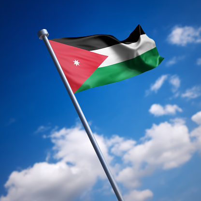 Flag of the Kingdom of Jordan. Shallow depth of field and motion blur 3d render.