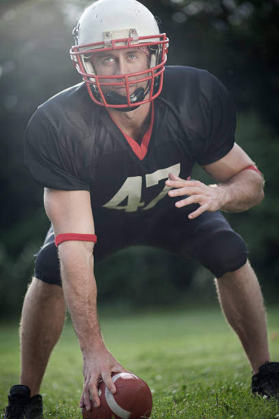 istock American Football Player in a three-point stand 471727225