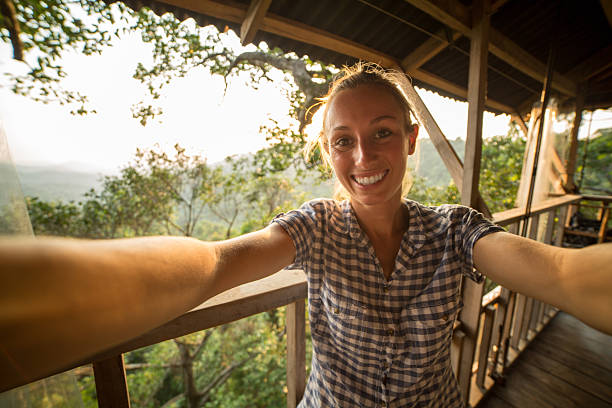 istock Young cheerful woman taking a selfie in nature 471727814