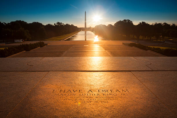 Washington Monument from the Lincoln Memorial Washington D.C., USA - September 23, 2012: Martin Luther King quote inscription on the steps of the Lincoln Memorial on The National Mall. "I Have a Dream" was a public speech delivered by American civil rights activist Martin Luther King Jr. on August 28, 1963, in which he calls for an end to racism in the United States. Delivered to over 250,000 civil rights supporters from the steps of the Lincoln Memorial during the March on Washington, the speech was a defining moment of the American Civil Rights Movement. lincoln memorial photos stock pictures, royalty-free photos & images