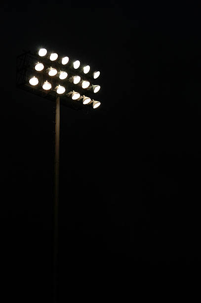 istock Stadium lights in a darkened field 471729947