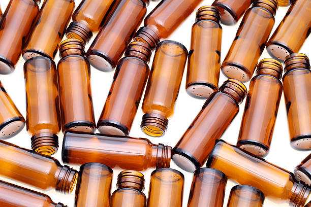 istock Brown medicine bottles 471730319
