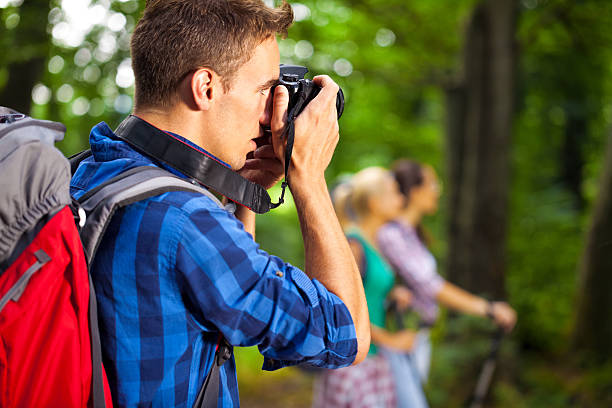 istock Hiking photographer taking pictures 471730971