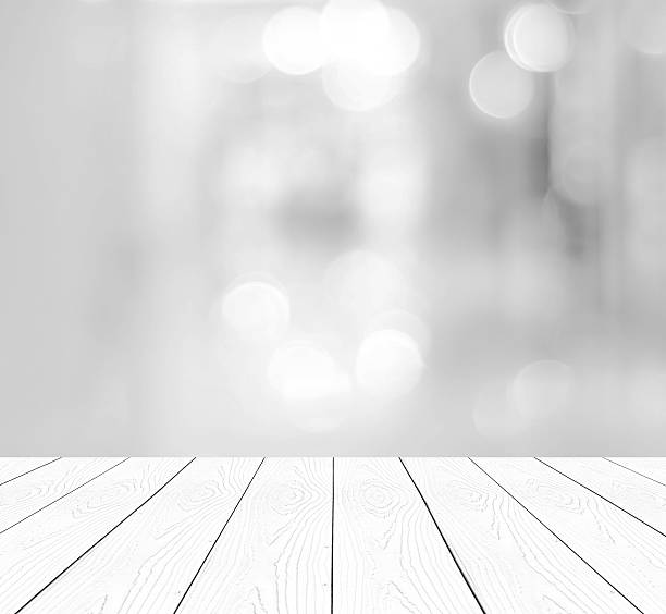 istock Perspective white wood and blurred store with bokeh background 471731418