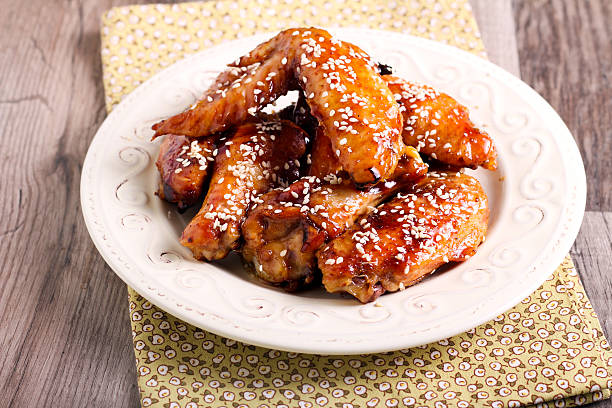 istock sticky sesame chicken wings 471731636