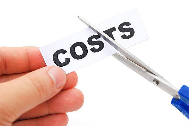 istock cutting down a tag of costs on white 471732023