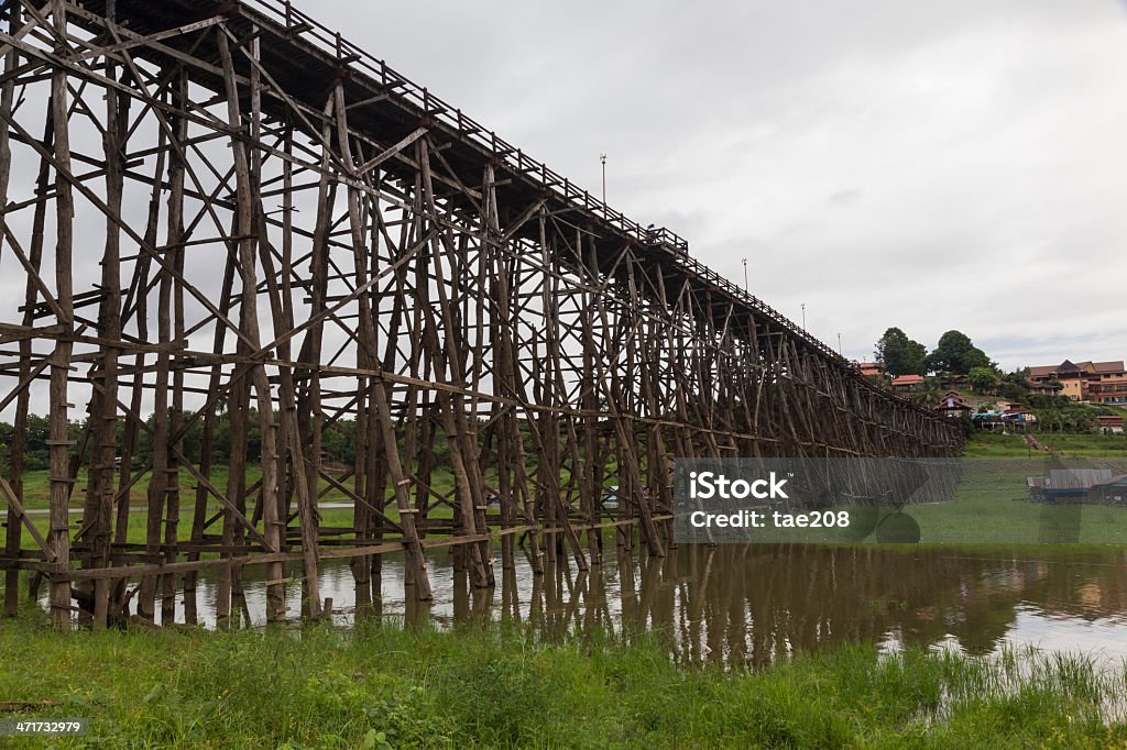 Wooden Mon bridge in Thailand Wooden Mon bridge of Sangkhlaburi in Thailand Arranging Stock Photo