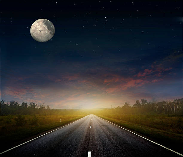istock Country road with a dark sky 471733097