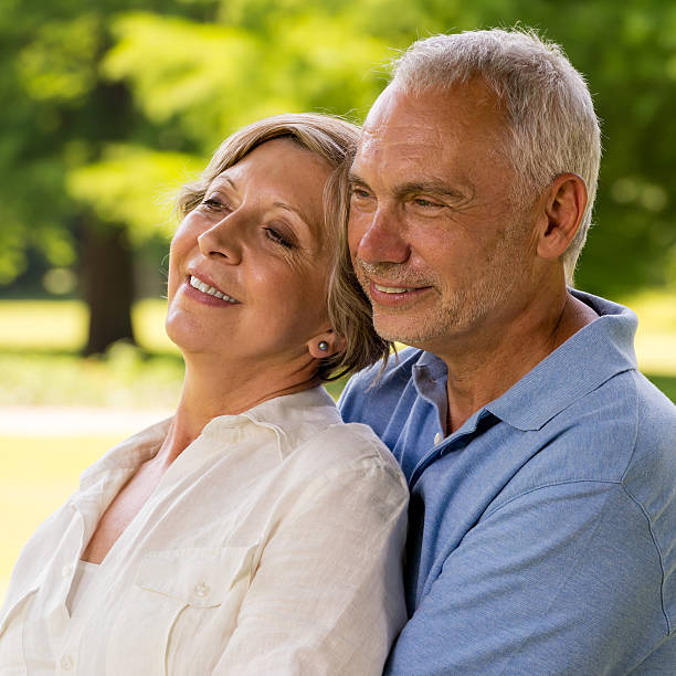 istock Senior couple embracing in nature 471733381