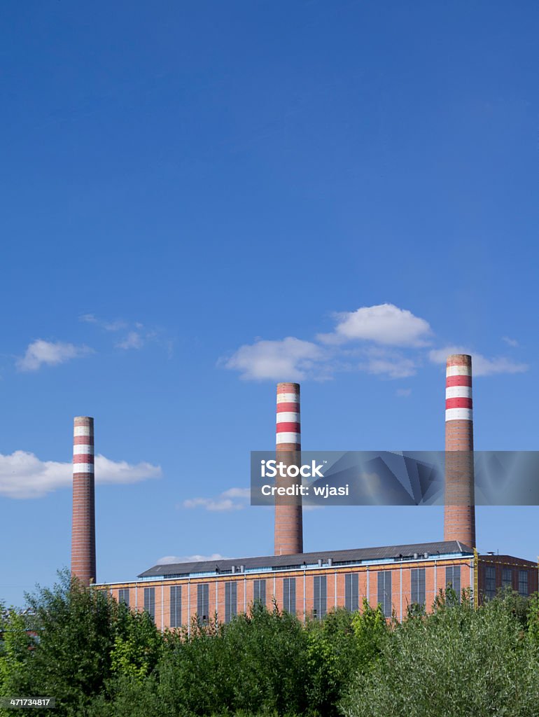 Factory A factory with three chimneys. Accidents and Disasters Stock Photo