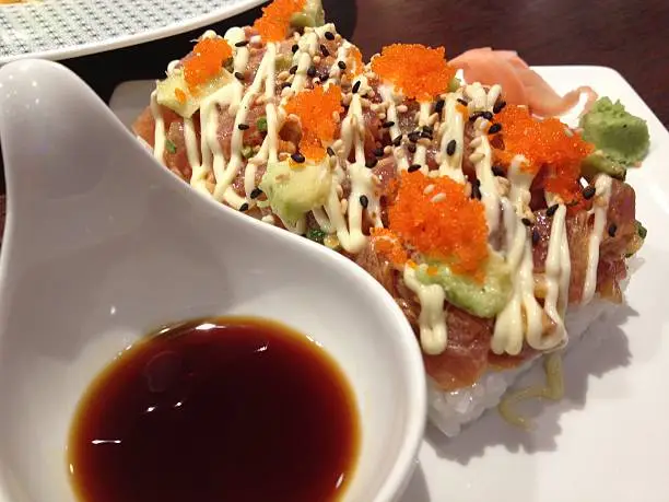 Salmon roll with soy sauce