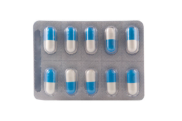 istock Blue and white capsule in transparent blister pack 471737167