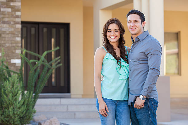 istock Cute young couple at their new home 471737415