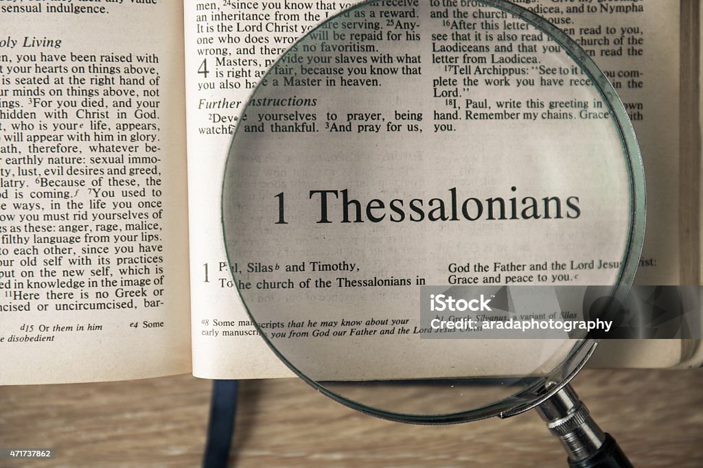 the book of 1 Thessalonians Reading The New International Version 2015 Stock Photo