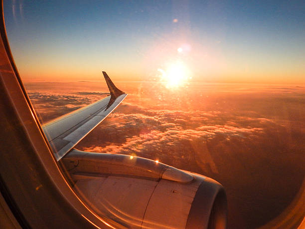 istock Sunlight from the porthole on airplane 471740164