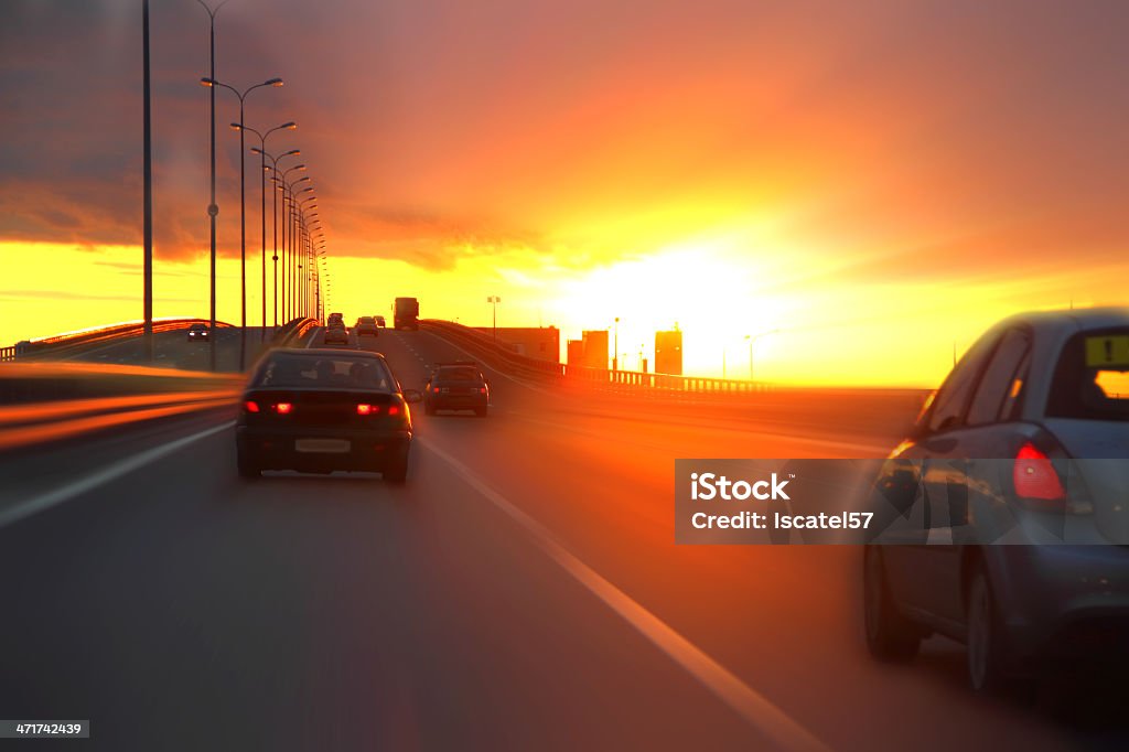 car on highway car at sunset on the highway Abstract Stock Photo