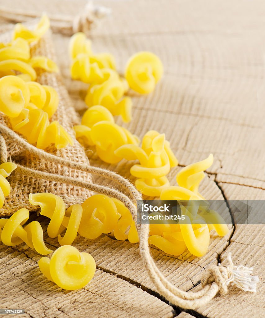 Pasta Pasta on a wooden table. Selective focus Close-up Stock Photo