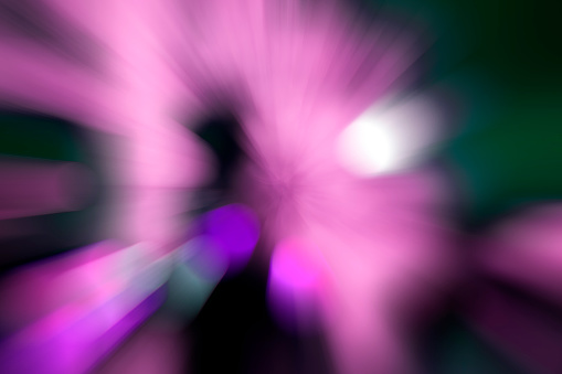 Unique abstract background with blurred, zoomed photographic effects.  lines Purple, green hues in this modern, monochromatic background image. Vanishing point in center of image. Many modern art concepts: psychedelic,  surrealism, ethereal, emergence, funky, techno.
