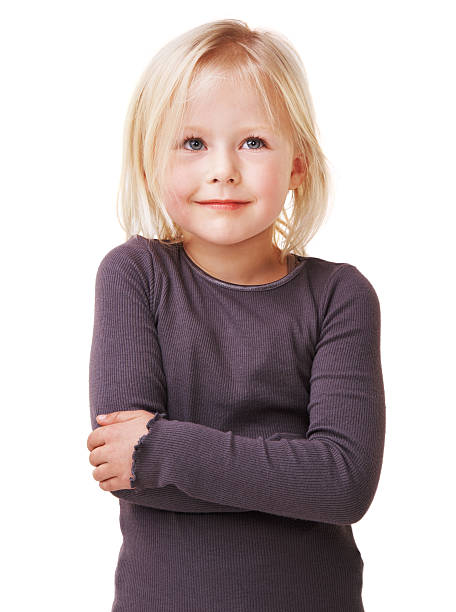 A shy little girl standing with arms crossed against a white backgroundhttp://195.154.178.81/DATA/i_collage/pi/shoots/781875.jpg
