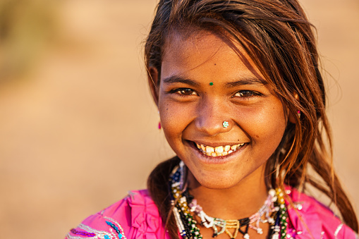 Happy Gypsy Indian girl from desert village, Thar Desert, Rajasthan, India.http://bem.2be.pl/IS/rajasthan_380.jpg