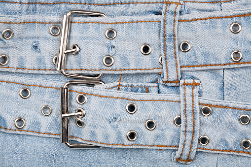 Closeup shot of jeans front with massive belt