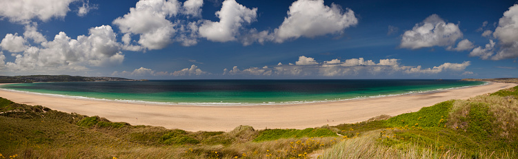 Summer Panorama of St Ives Bay viewed from the sand dunes mid way between Hayle & Gwithian