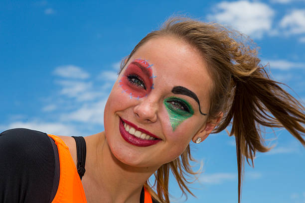istock Young Female Circus Clown in the Desert 471747725