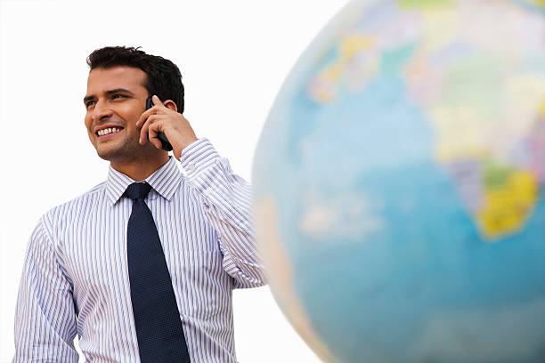 istock Businessman talking on a mobile phone and smiling 471748537
