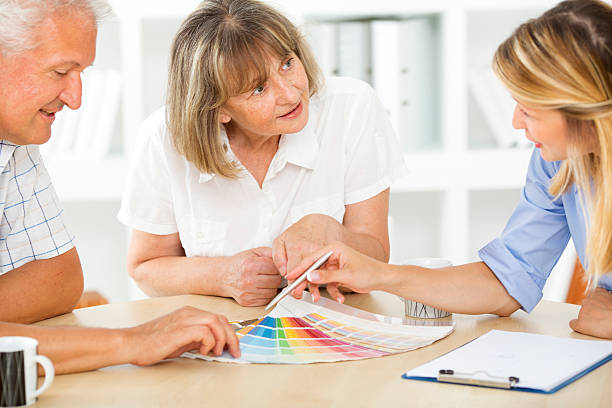 istock Senior Couple Meeting With Designer. 471749883