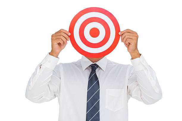 istock Businessman hiding his face behind a red bulls eye 471750165