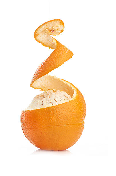istock orange with peeled spiral skin 471751101