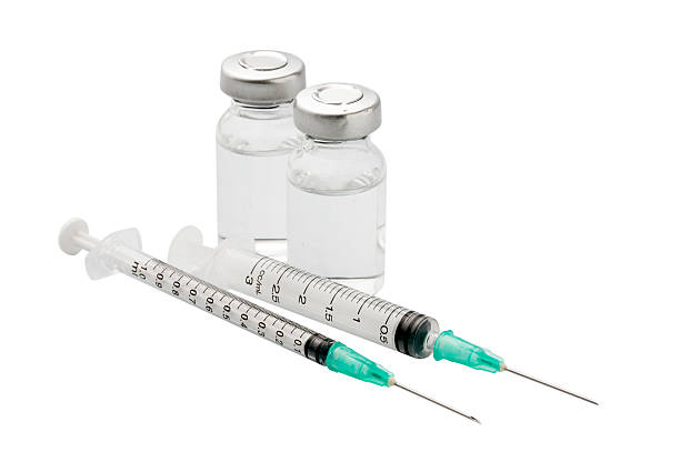 istock Medical ampules and syringe isolated 471753102