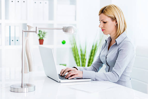 istock Business woman using laptop. 471754715