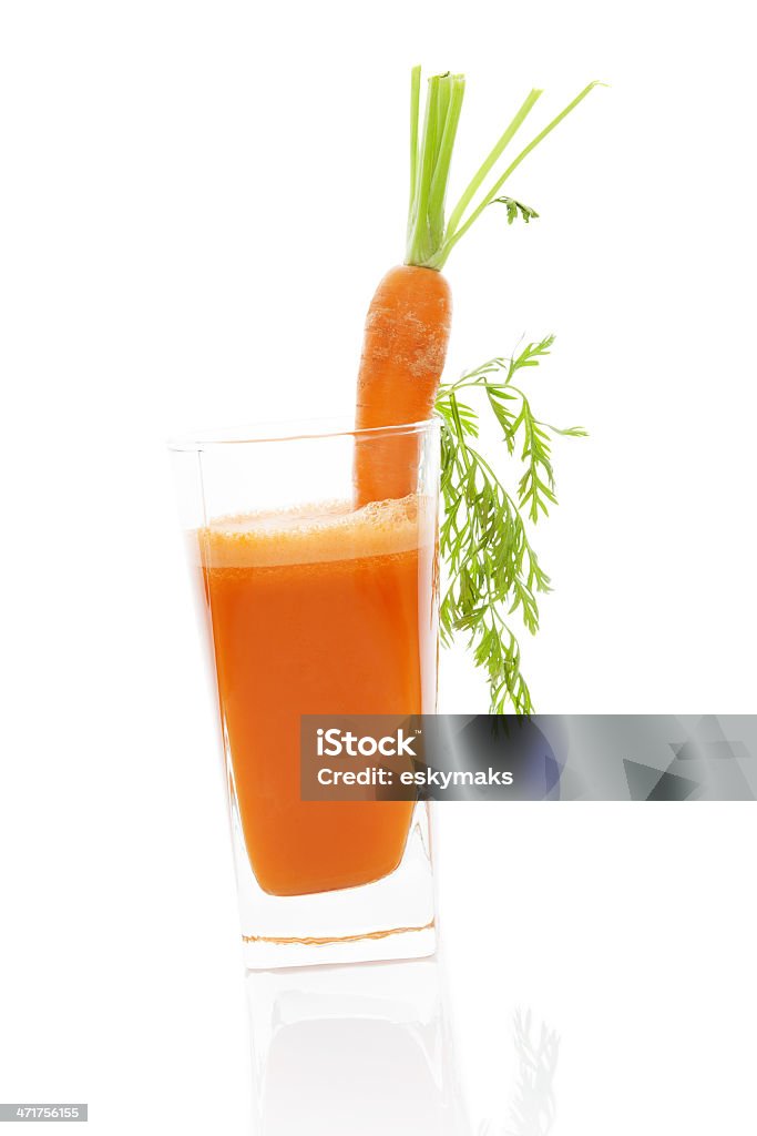 Carrot juice. Carrot and carrot juice isolated on white background. Juicing and healthy, long and prosperous living. Brightly Lit Stock Photo