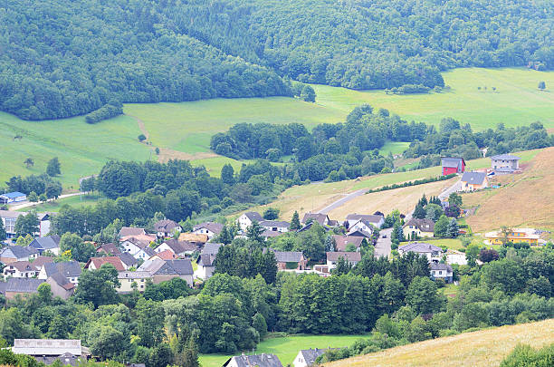 istock Small village in green valley 471756477