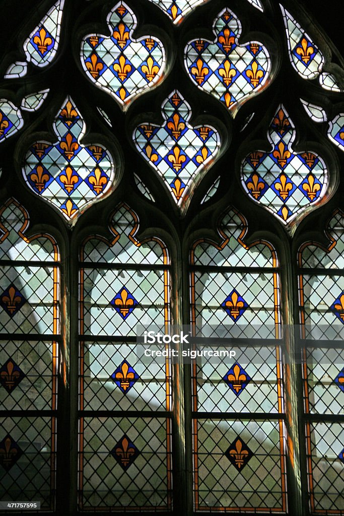 Stained glass windows, France Stained glass windows, Saint Denis Basilica, France Fleur De Lys Stock Photo