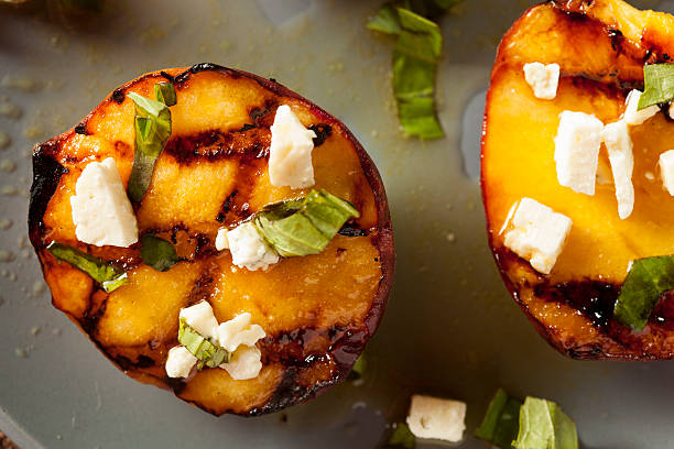 istock Gourmet Roasted Peaches with cheese and basil 471758257