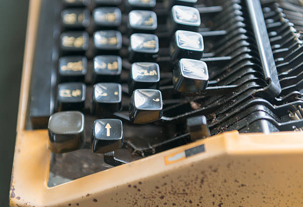 istock Close up of antique typewriter keys, focus on enter key. 471760346